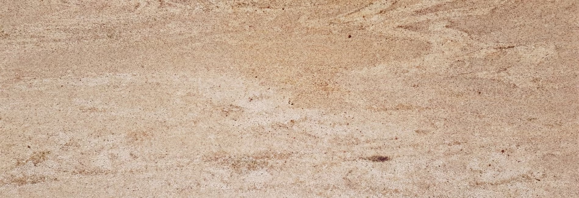 naturstein-oberflaeche-sandstein-beige-gundersdorff Beige Natursteinoberfläche mit sichtbarer Struktur